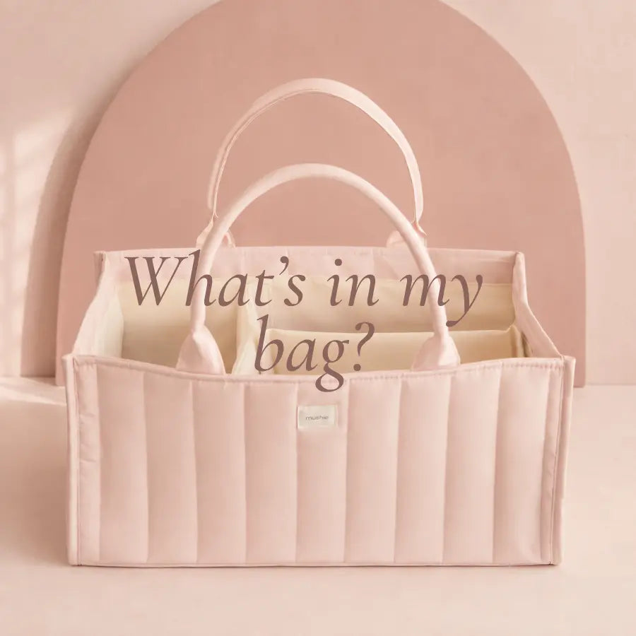 Mushie Diaper Caddy in Blush with the text “What’s in my bag?” for a Littledeluxe Instagram post.