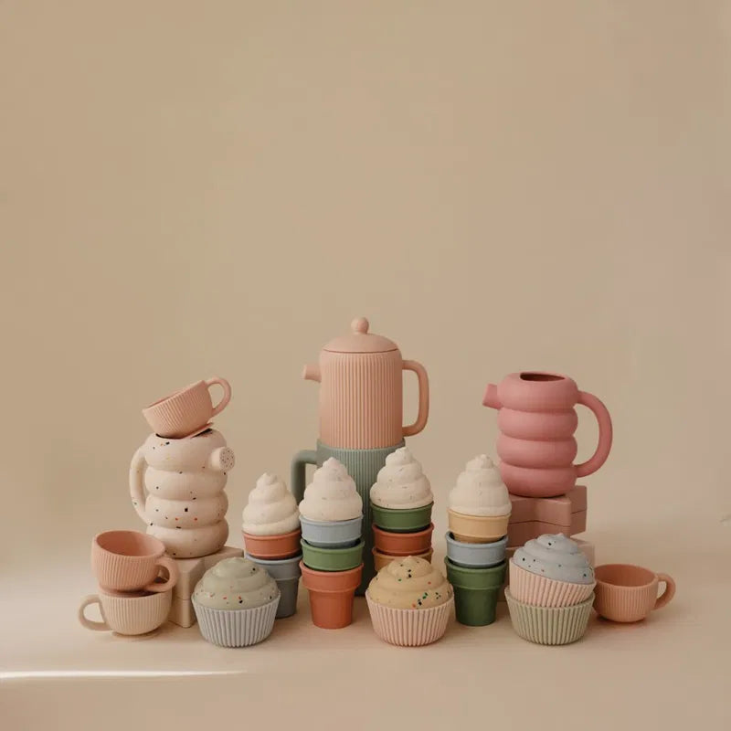 Mushie silicone watering can