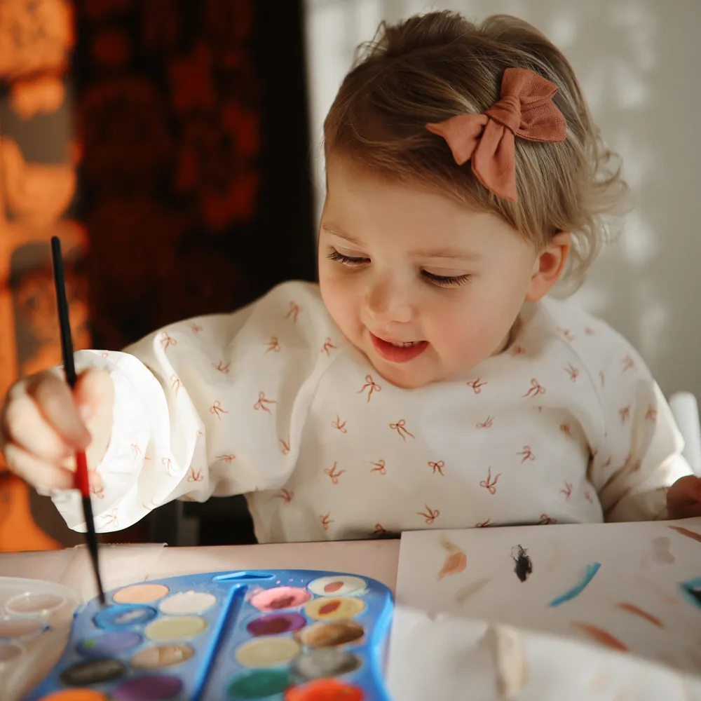 Mushie long sleeve bib