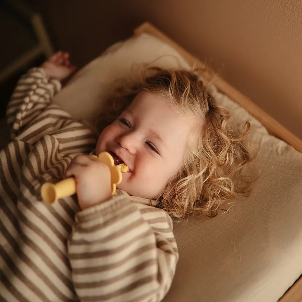 Mushie training toothbrush