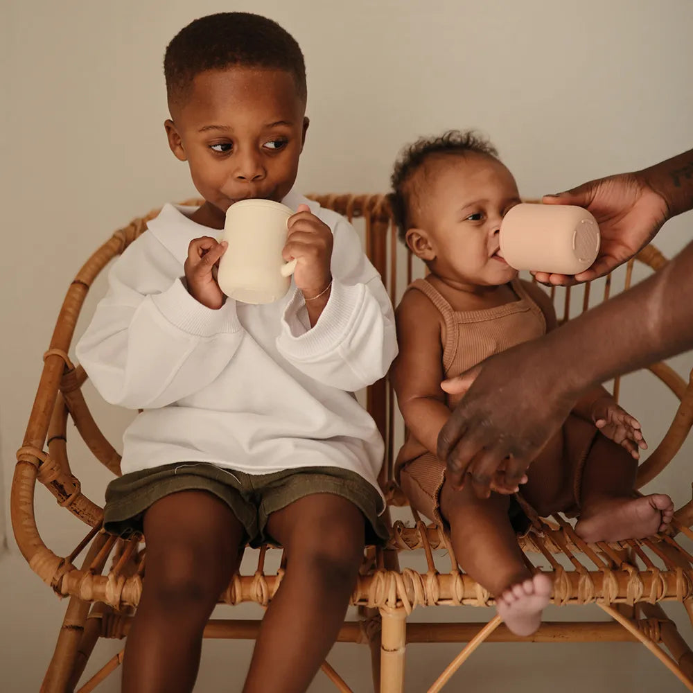 Mushie silicone training cup with straw