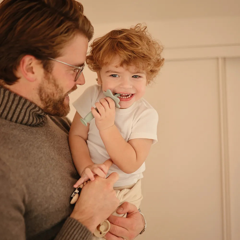 Mushie training toothbrush