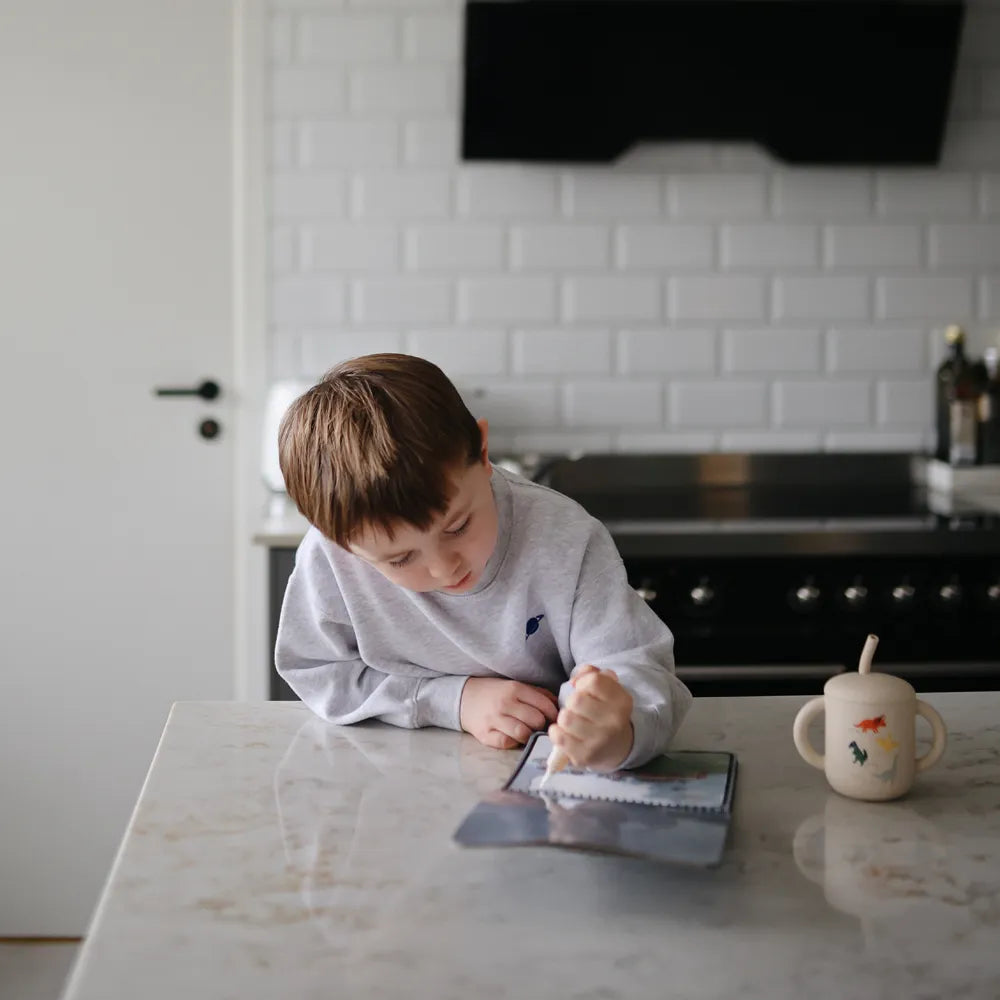 Mushie silicone training cup with straw