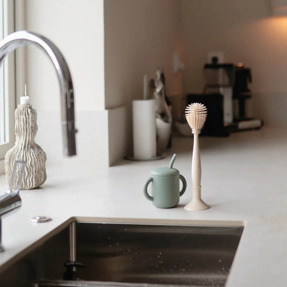 Mushie silicone training cup with straw