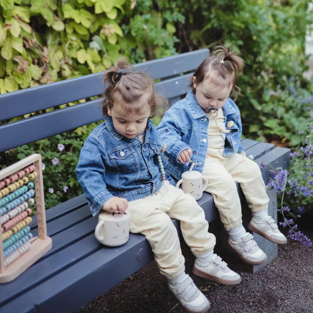 Mushie silicone training cup with straw